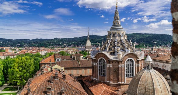 Turin, Torino, aerial timelapse skyline panorama with Mole Antonelliana, Monte dei Cappuccini and the Alps in the background. Italy, Piemonte, Turin.
