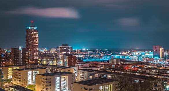Panoramic picture at night of the skyline from Enschede, Holland, The Netherlands.