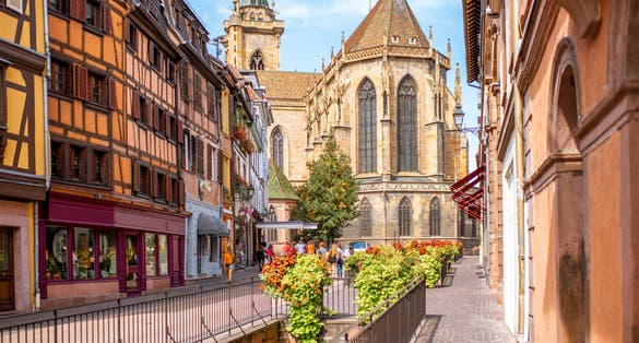 Photo of cityscaspe view on the old town with saint Martin cathedral in Colmar, famous French town in Alsace region, France.