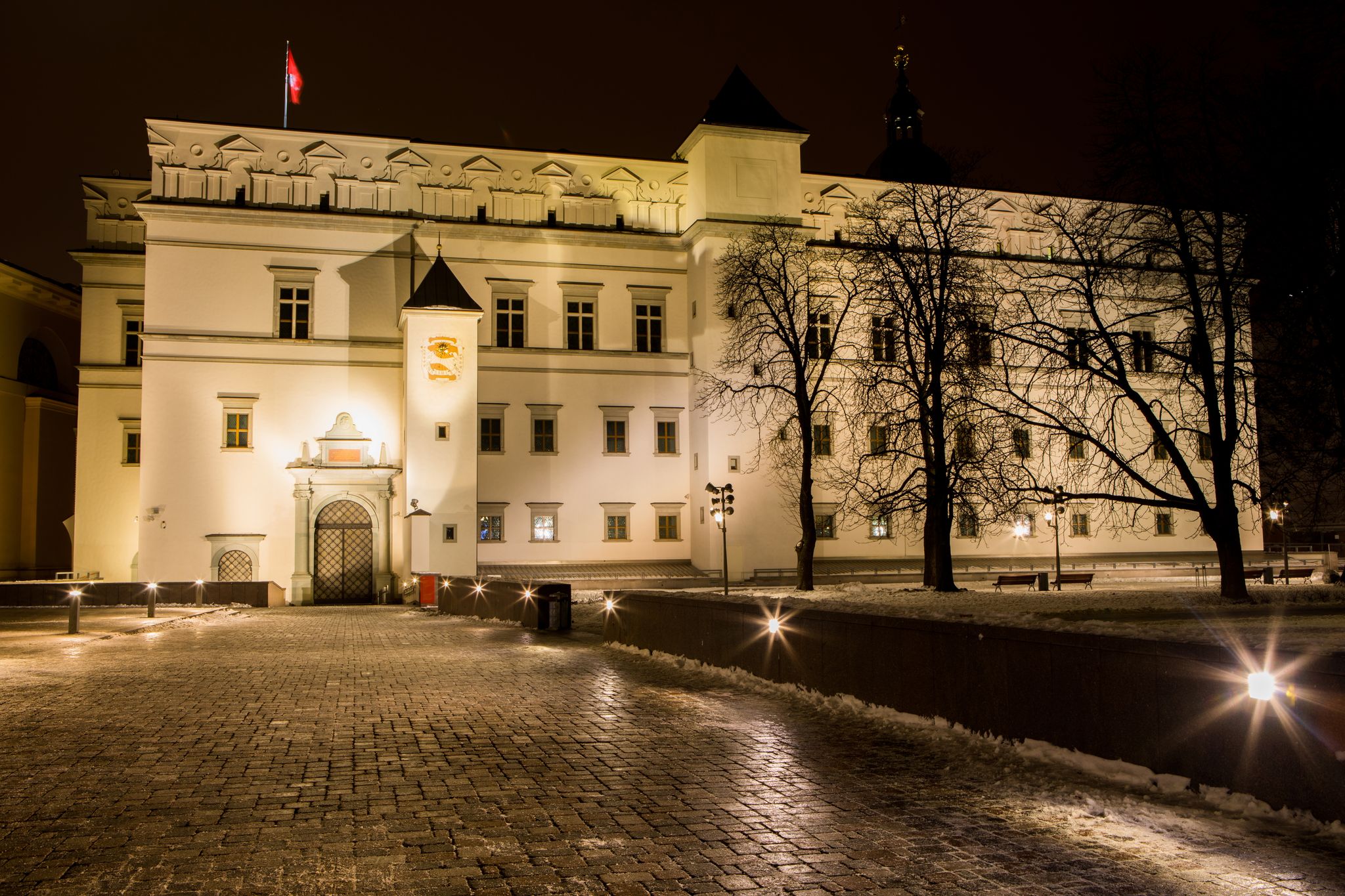 photo of night view of palace of the grand dukes of Lithuania in Vilnius.