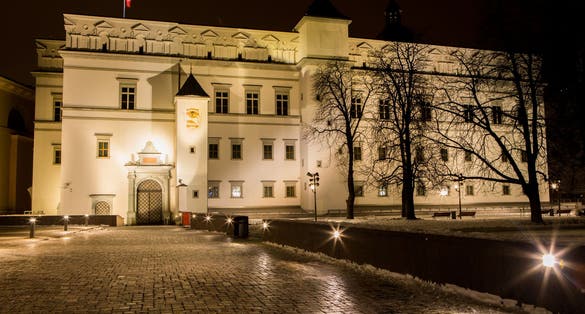 photo of night view of palace of the grand dukes of Lithuania in Vilnius.