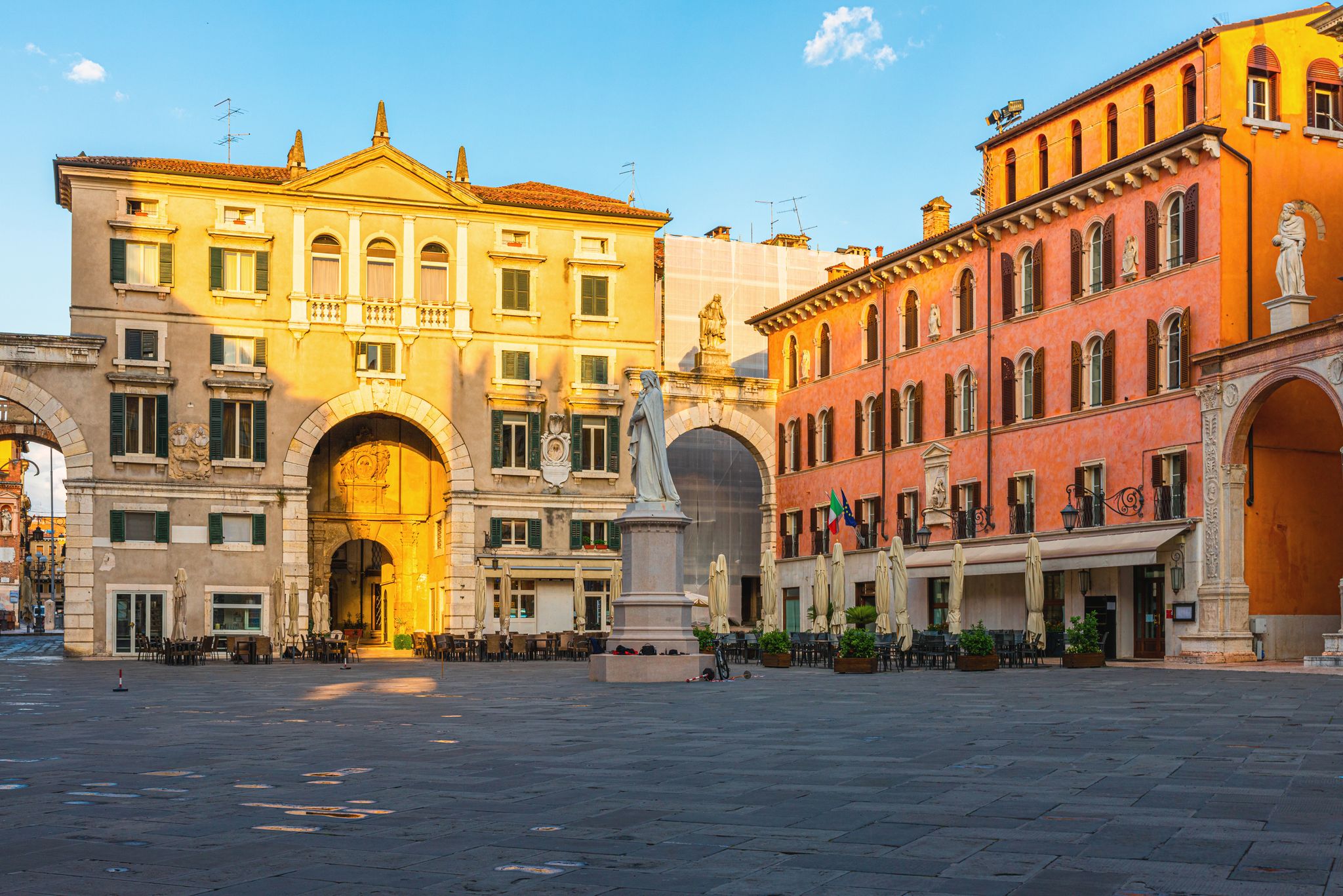 Famous buildings, gondolas and monuments by the Rialto Bridge of Venice on the Grand Canal, Italy.
