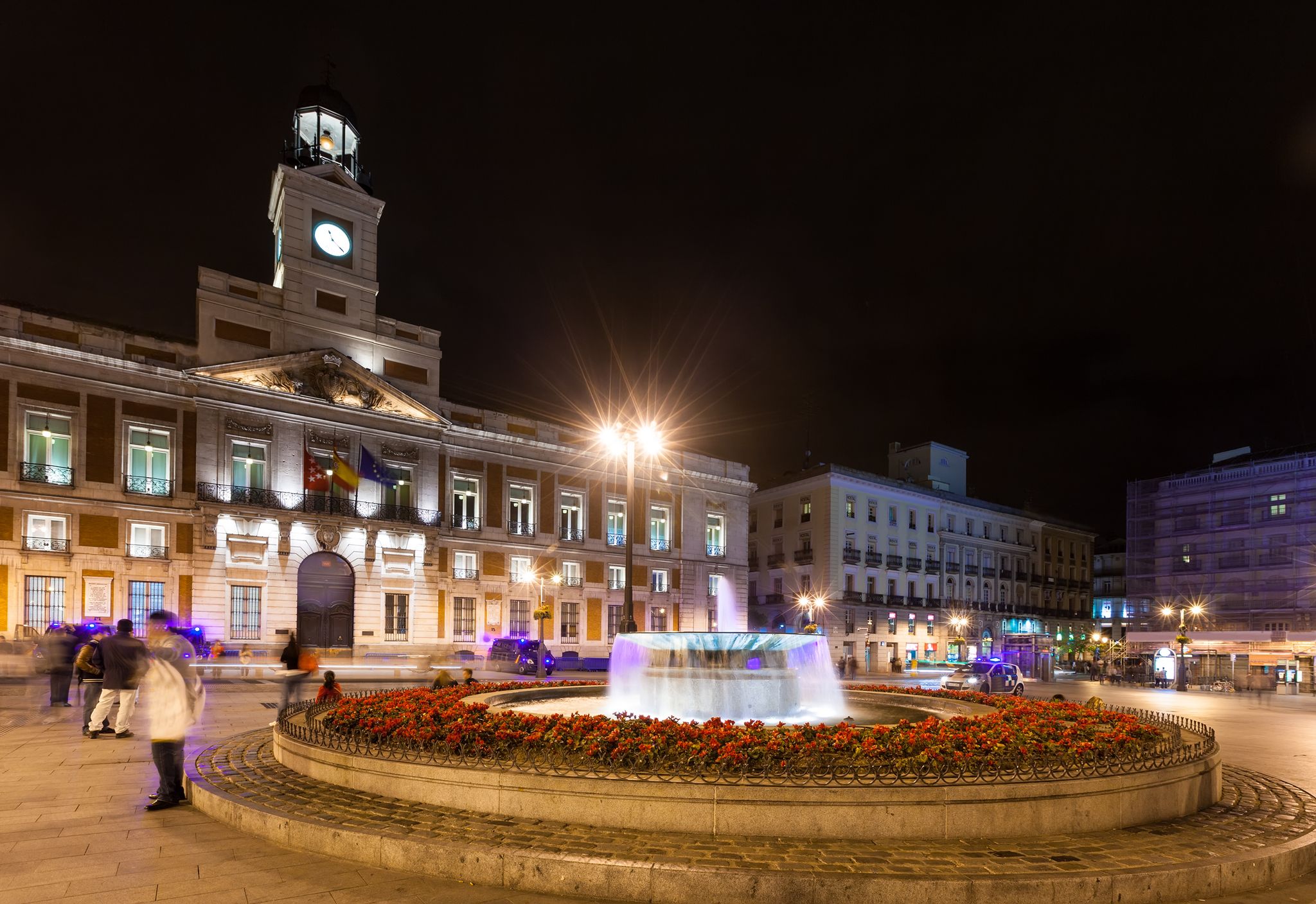 Photo of Night street of Madrid. Post Office at Puerta del Sol .