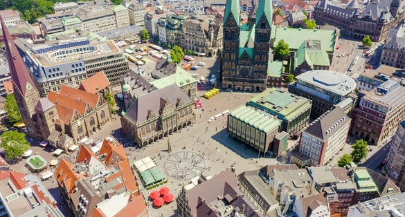 Bremen, Germany. Bremen Market Square ( Bremer Marktplatz ), Bremen Cathedral ( St. Petri Dom Bremen ). View in flight, Aerial View