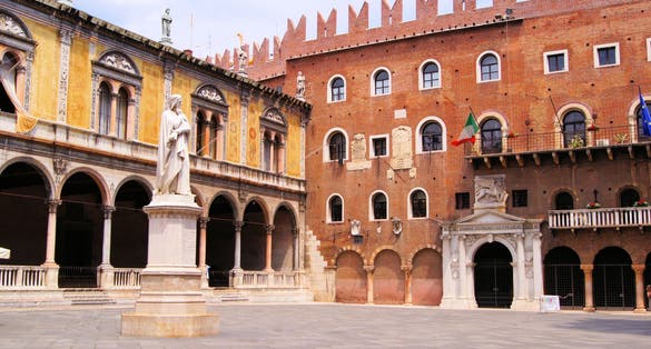 photo of Verona, Italy - Piazza dei Signori with Dante statue .