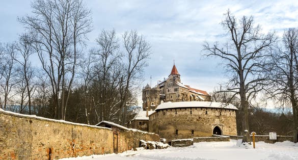 Photo of beautiful scenic view of historical medieval Pernstejn castle in winter, Czech Republic.
