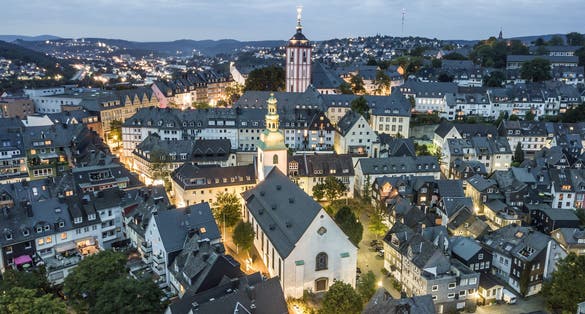 Aerial view over the old town of Siegen at dusk. North Rhine-Westphalia, Germany