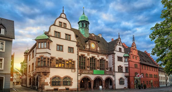 photo of old Town Hall (Altes Rathaus) on sunrise in Freiburg im Breisgau, Baden-Wurttemberg, Germany.