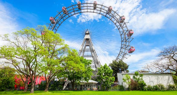 Photo of the Wiener Riesenrad or Vienna Giant Wheel 65m tall Ferris wheel in Prater park in Austria.