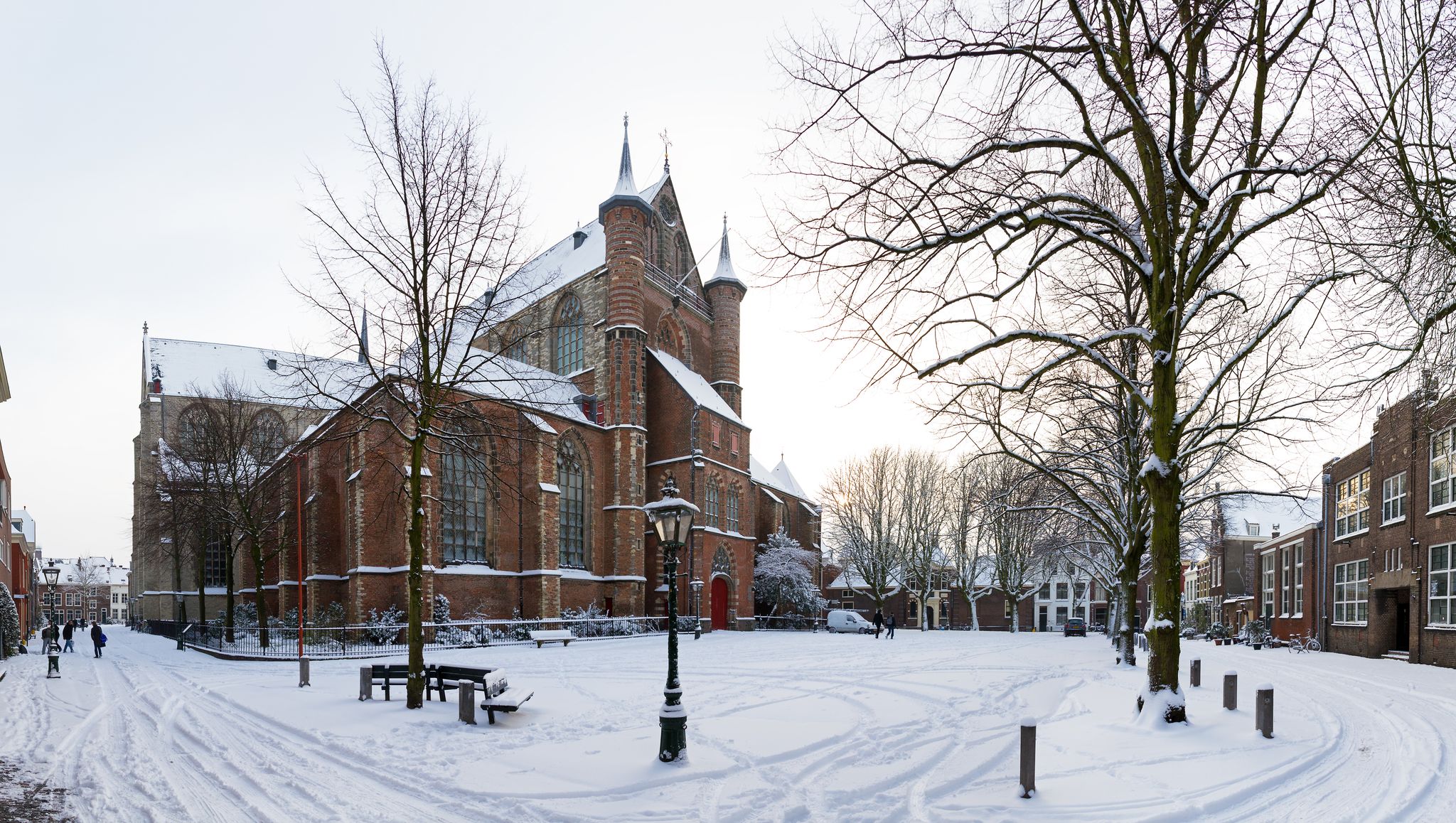photo of winter cityscape panorama of the Pieterskerk church (1121) in Leiden, the Netherlands.