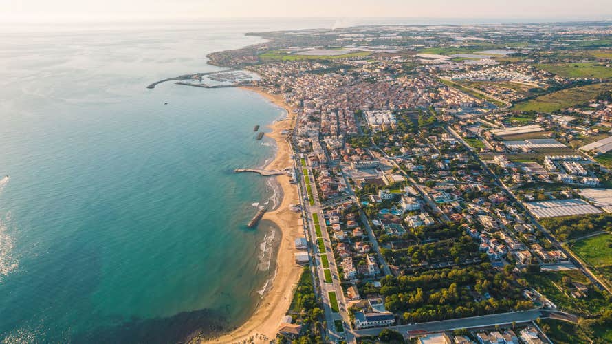 Photo of aerial View of Marina di Ragusa and Mediterranean Sea at Sunset, Sicily, Italy.
