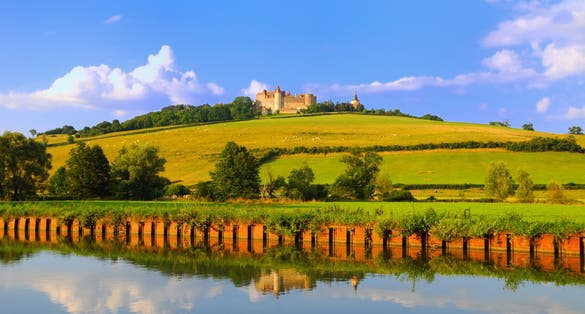 photo of Châteauneuf Castle in Châteauneuf from the Dijon canal in France.
