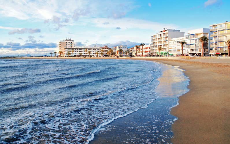 Beach in front of the buildings at Le Grau du Roi in Occitanie, France.