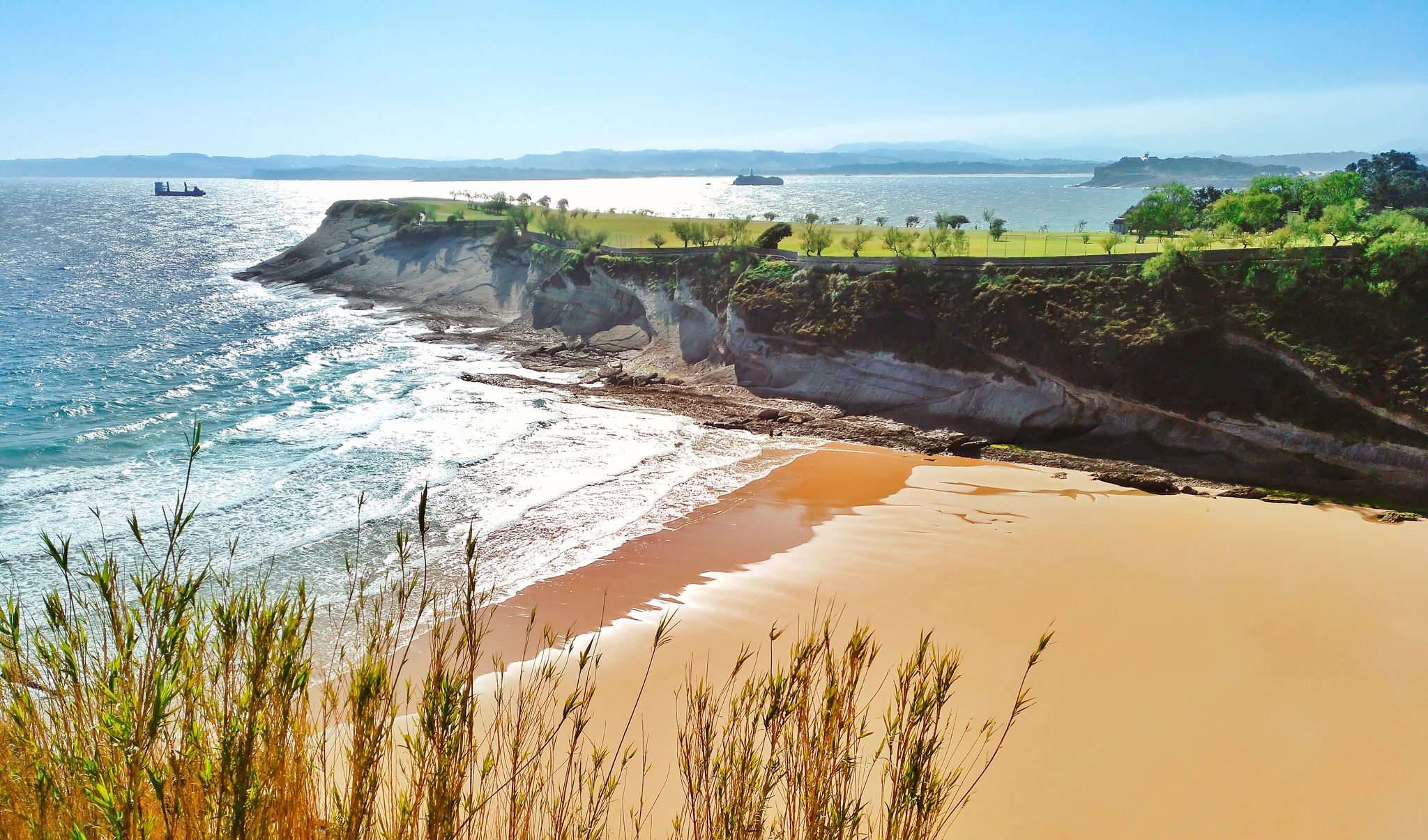 Photo of Aerial view from above of Mataleñas beach (Playa de Mataleñas) in Santander, Cantabria, Spain .