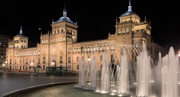 Photo of night view of the building of cavalry in the city of Valladolid, Spain.