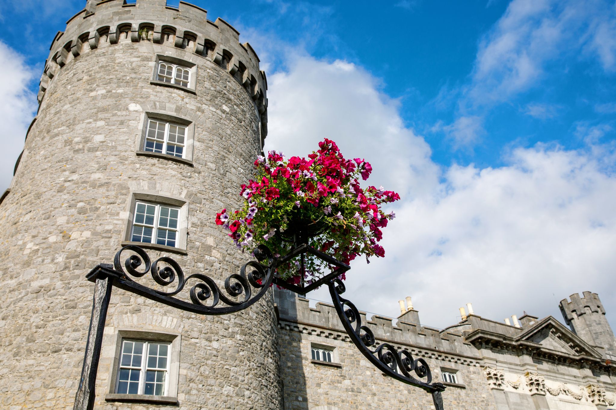 photo off view of Kilkenny Castle, Ireland. Caislean Chill Chainnig. A castle in Kilkenny, Ireland built in 1195 to control a fording-point of the River Nore