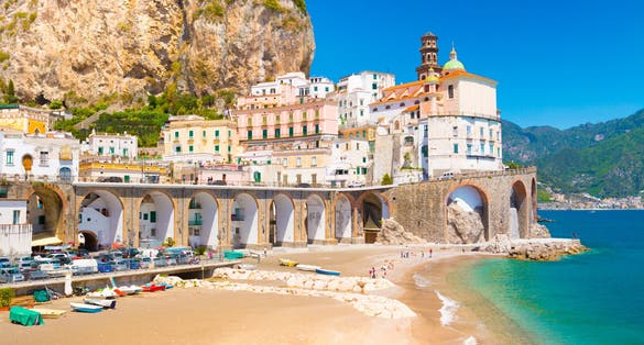 Morning view of Amalfi cityscape on coast line of mediterranean sea, Italy