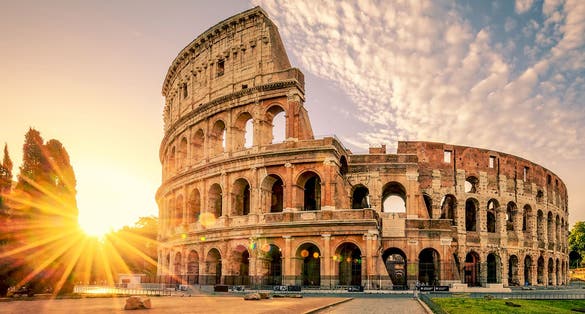 photo of Colosseum in Rome at sunrise, Italy, Europe.