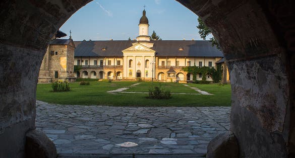 Photo of Living quarter of the Neamț Orthodox Monastery, seen from the entrance arched wall gate.