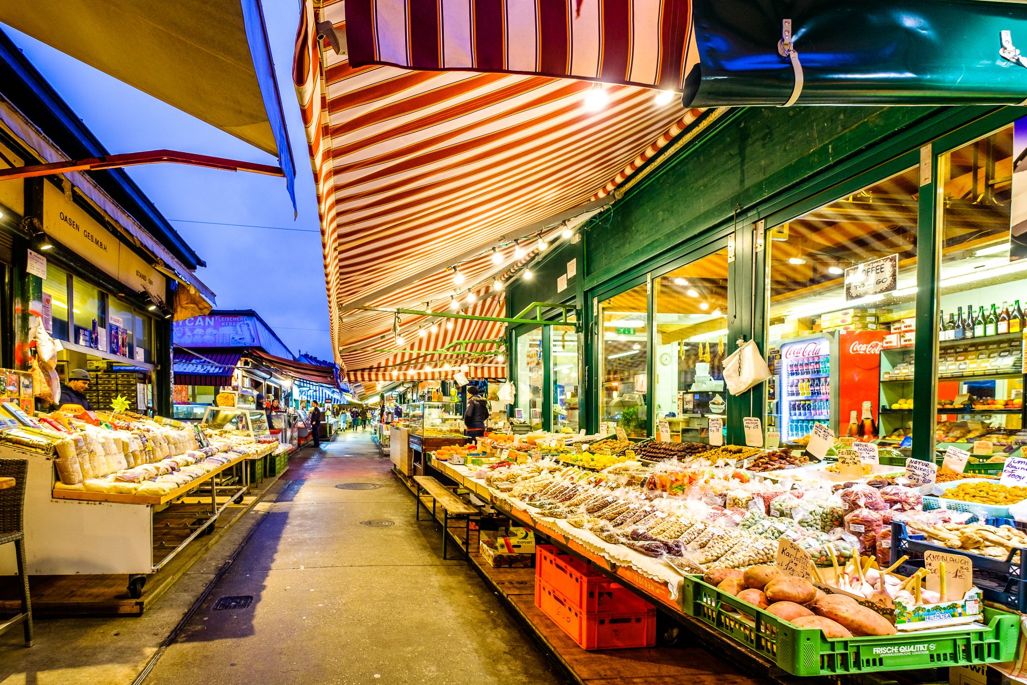 Photo of Naschmarkt in Vienna. It is a famous food, souvenir and flea market in the middle of Vienna, Austria.