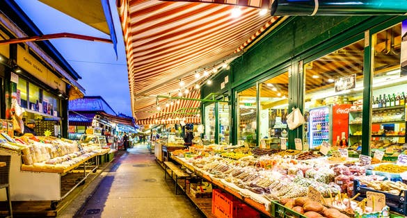 Photo of Naschmarkt in Vienna. It is a famous food, souvenir and flea market in the middle of Vienna, Austria.