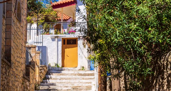 Photo of street view in traditional Kalamata greek fishing village of Koroni, Greece in Peloponnese.