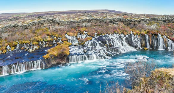 photo ofLandscape View Of Hraunfossar And Barnafossar Waterfall With Autumn Red, Northwest Region of Iceland.
