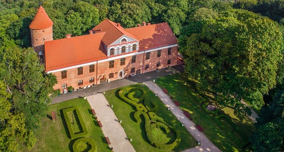 photo of raudondvaris is a manor house with park in kaunas district, Lithuania.