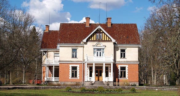 Photo of Olustvere manor in spring. Main building, one of the most fully preserved manor complexes in Estonia.
