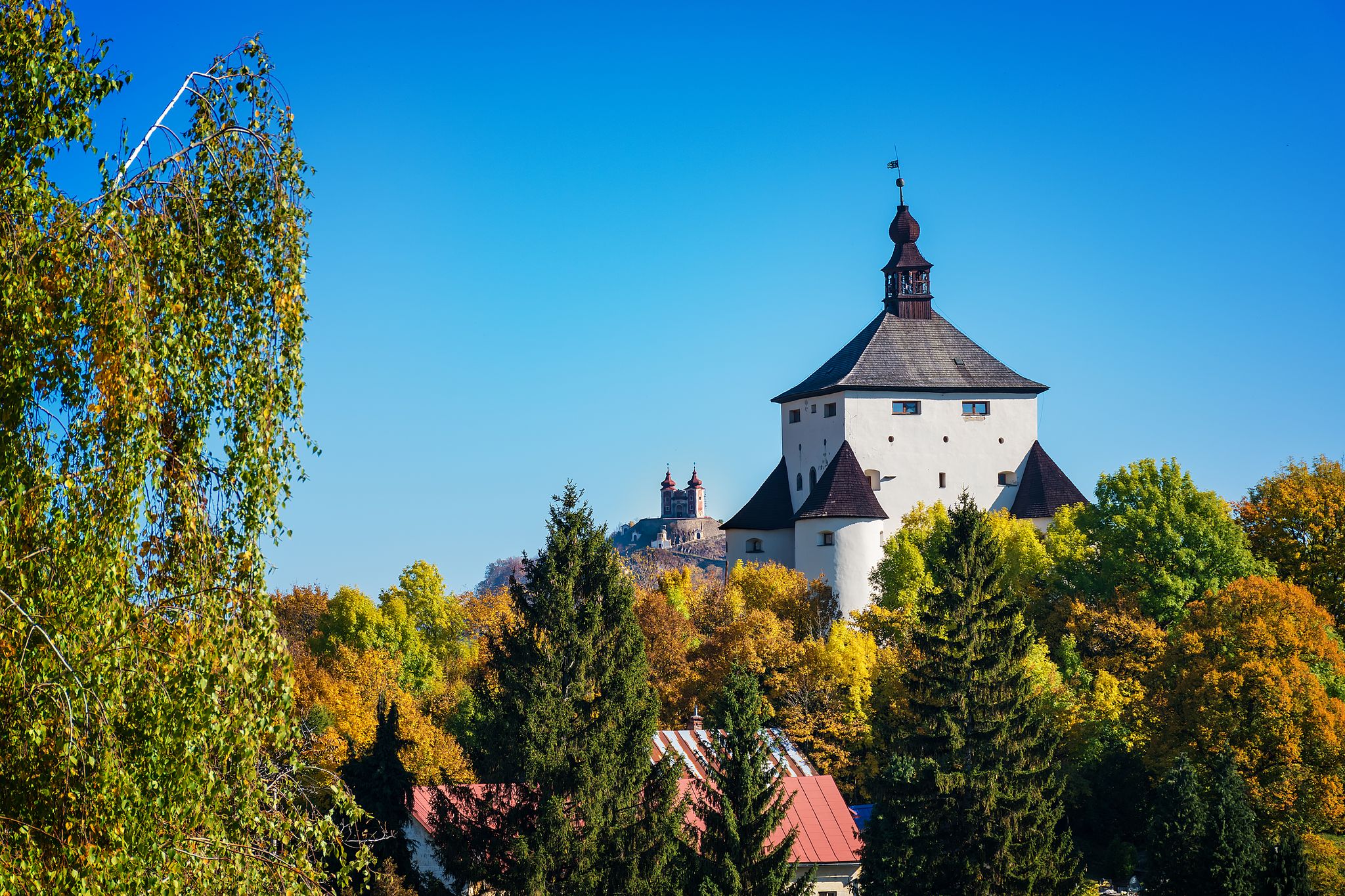 Photo of New castle and Calvary - autumn in Banska Stiavnica, Slovakia, UNESCO,