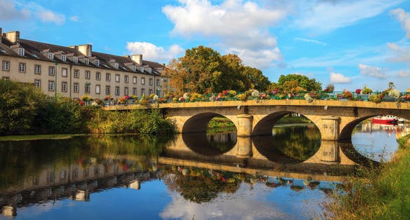 Photo of reflection of a bridge on Nantes Brest canal in Pontivy Brittany France