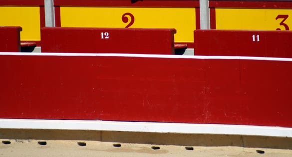 Photo of PAMPLONA, SPAIN. JULY 11, 2009. Sanfermines party. Free bullfighting festival that takes place in the morning run of steers with future bullfighters.