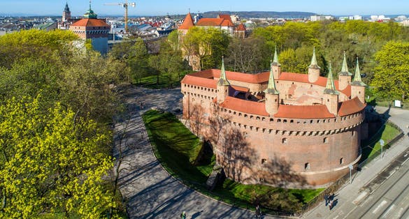 Barbican (Barbakan) in Cracow, Poland. The best preserved medieval barbican in Europe and Planty park surrounding the old city. Aerial view