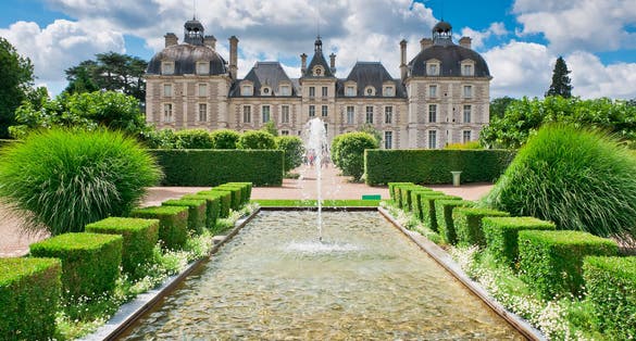 photo of the beautiful Château de Cheverny from apprentice's garden in France.