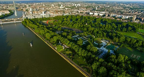 Photo of aerial View of Battersea Park feat. River Thames and Chelsea Bridge in London, UK.