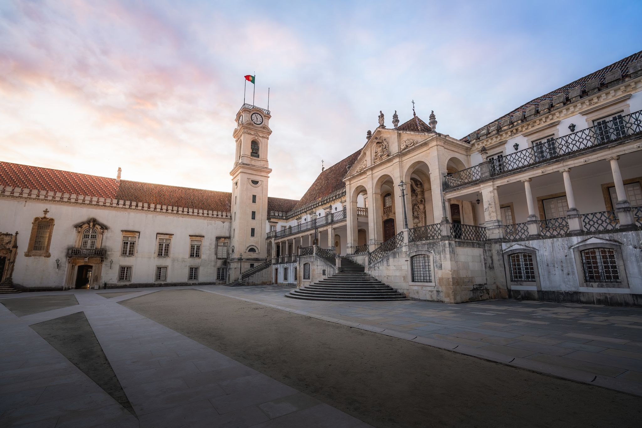 Photo of University of Coimbra courtyard (Paco das Escolas) at sunset, former Royal Palace - Coimbra, Portugal.