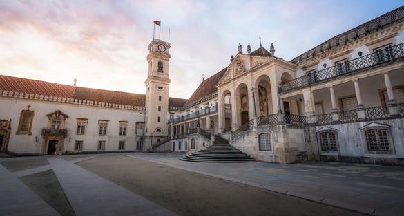 Photo of University of Coimbra courtyard (Paco das Escolas) at sunset, former Royal Palace - Coimbra, Portugal.