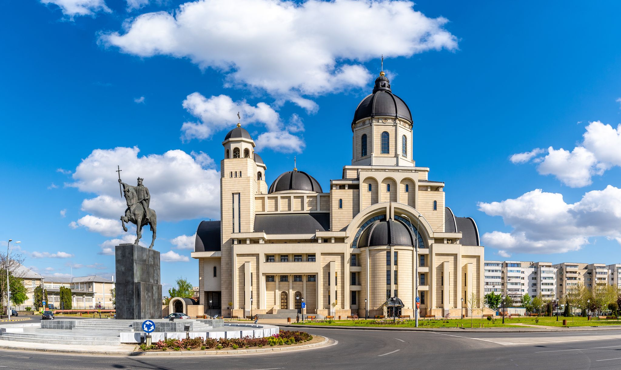 photo of view of The statue of Stefan Cel Mare and Cathedral in center of Bacau city, Moldavia landmark, Romania