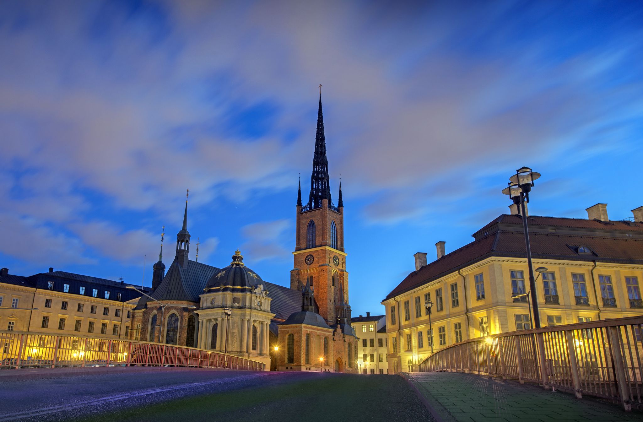 photo of Riddarholm Church at night in Stockholm, Sweden.