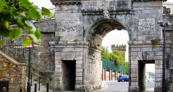 photo of view of Derry, North Ireland. Aerial view of Derry Londonderry city center in Northern Ireland, UK. Sunny day with cloudy sky, city walls and historical buildings