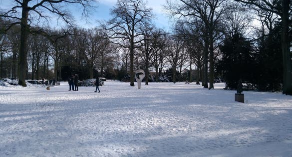photo of Stadswandelpark in Eindhoven covered with snow in the Netherlands.