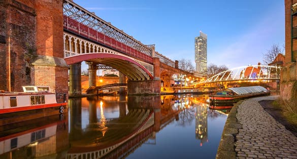 Photo of Manchester tallest building Beetham Tower, reflecting in Manchester Canal.