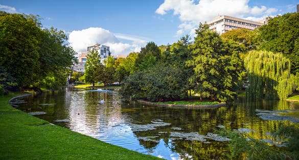 Photo of Laeold park with it's lake in Brussels, Belgium