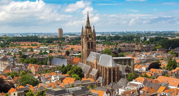 photo of panoramic aerial view of Delft with Nieuwe Kerk Delft in a beautiful summer day, The Netherlands.
