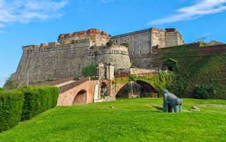 Photo of beautiful street and traditional buildings of Savona, Liguria, Italy.