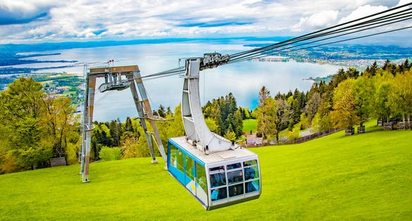 The Pfänder Cable car overlooking Lake Constance. Below is the Austrian town of Bregenz. With its views over the lake and the surrounding mountain peaks.