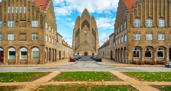 Photo of beautiful and Famous Lutheran Grundtvig's Church in the style of expressionism. Copenhagen, Denmark.