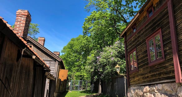 A street in an old Scandinavian village on a sunny day.