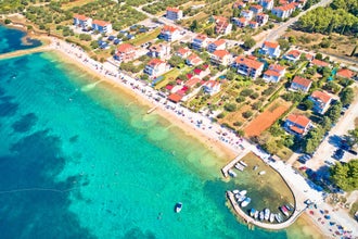 Biograd na Moru idyllic turquoise beach aerial view, Dalmatia region of Croatia