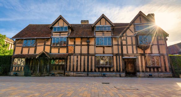 Photo of William Shakespeare's birthplace place house at sunrise on Henley Street in Stratford upon Avon in England, United Kingdom.
